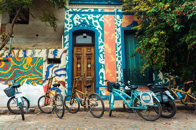 Private Off the Beaten Path: Hidden Urban Art Bike Tour - La Boca and Barracas murals: what you’re really seeing when the walls get huge