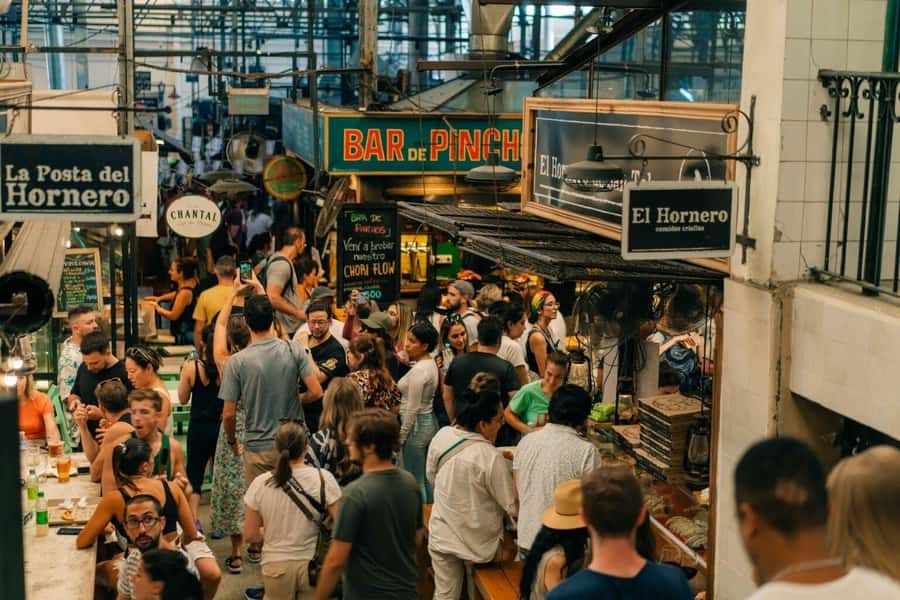 San Telmo: Historical Guided Tour with Street Food & Drinks - San Telmo Market: street bites, antiques, and a bodegón-style meal